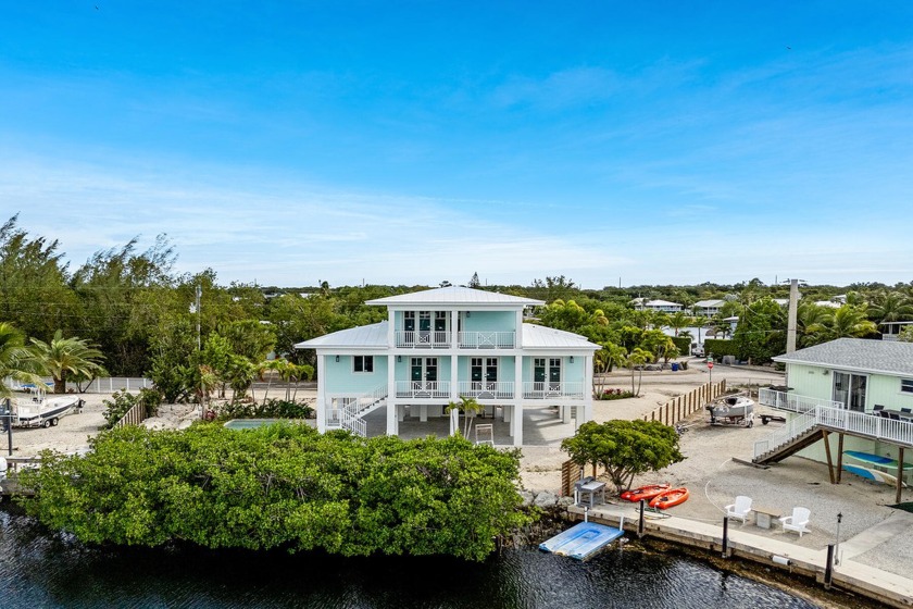 Experience modern coastal design and opulent island living in - Beach Home for sale in Key Largo, Florida on Beachhouse.com