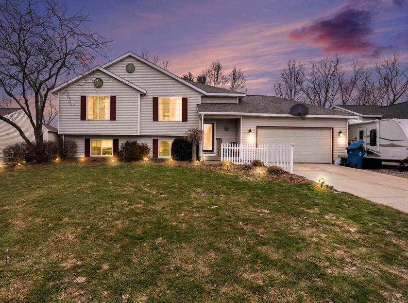 This beautifully designed home features an open-concept kitchen - Beach Home for sale in Holland, Michigan on Beachhouse.com