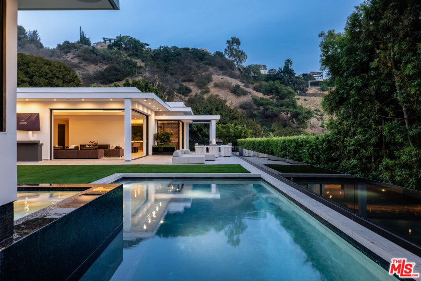 Ideally located in coveted Trousdale Estates, this contemporary - Beach Home for sale in Beverly Hills, California on Beachhouse.com