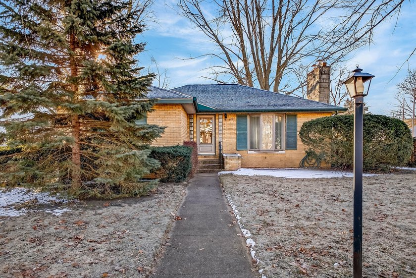 Welcome home to this classic brick ranch in the City of North - Beach Home for sale in Muskegon, Michigan on Beachhouse.com