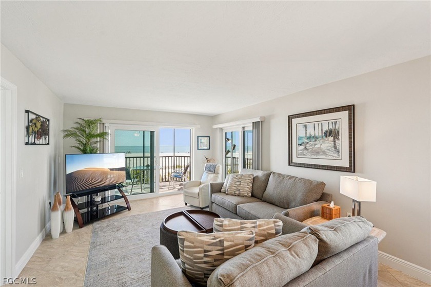 This stunning renovated 2-bedroom, 2-bathroom with bonus Den is - Beach Condo for sale in Fort Myers Beach, Florida on Beachhouse.com