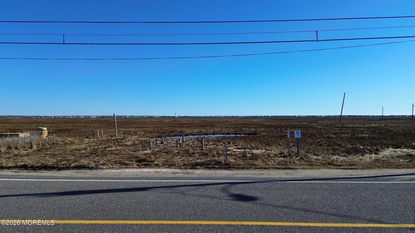 Soak in breathtaking, nearly 360 degrees water views from this - Beach Lot for sale in West Creek, New Jersey on Beachhouse.com