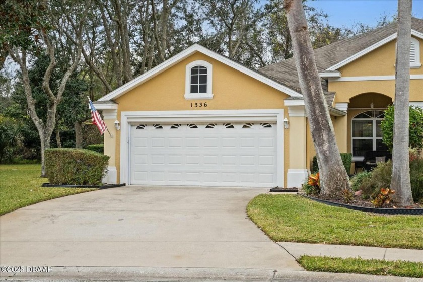 Discover this charming 3-bedroom, 2-bath villa with a 2-car - Beach Home for sale in Ormond Beach, Florida on Beachhouse.com