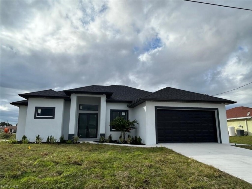 Welcome to a breathtaking new construction single-family home - Beach Home for sale in Cape Coral, Florida on Beachhouse.com