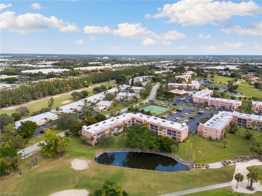 Wake up to serene lake and golf course views from this furnished - Beach Home for sale in Naples, Florida on Beachhouse.com