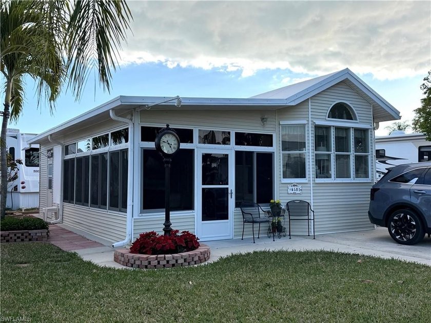 This charming 1997 Mobile Home with enclosed screen room is - Beach Home for sale in Estero, Florida on Beachhouse.com