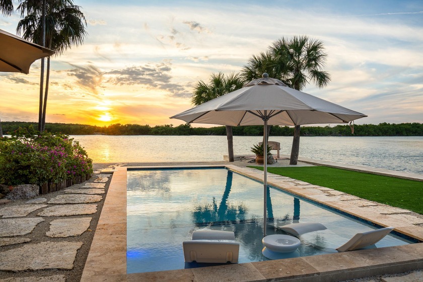 Absolutely stunning waterfront property! Nestled on a rare point - Beach Home for sale in Plantation Key, Florida on Beachhouse.com