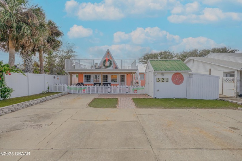 This charming beachside bungalow offers an unbeatable location - Beach Home for sale in New Smyrna Beach, Florida on Beachhouse.com