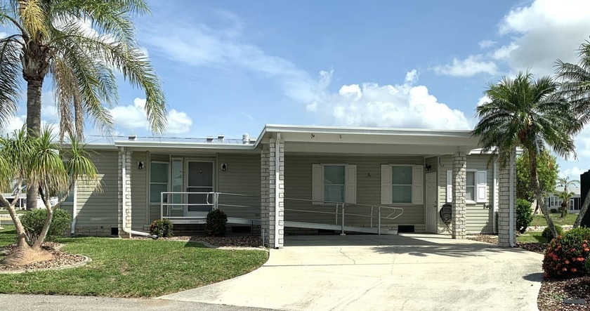 Beautiful 3-Bedroom, 2-Bathroom Home with Stunning Lake Views! - Beach Home for sale in Punta Gorda, Florida on Beachhouse.com