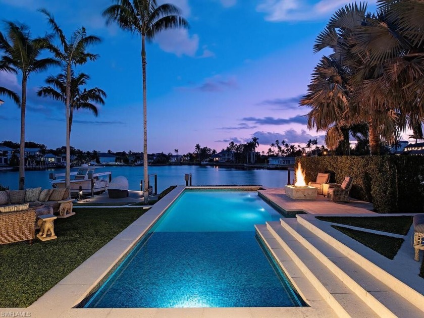 This custom waterfront residence was creatively designed by - Beach Home for sale in Naples, Florida on Beachhouse.com