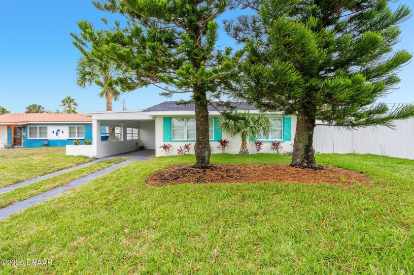 Welcome to your coastal escape! Perfectly situated just steps - Beach Home for sale in Ormond Beach, Florida on Beachhouse.com