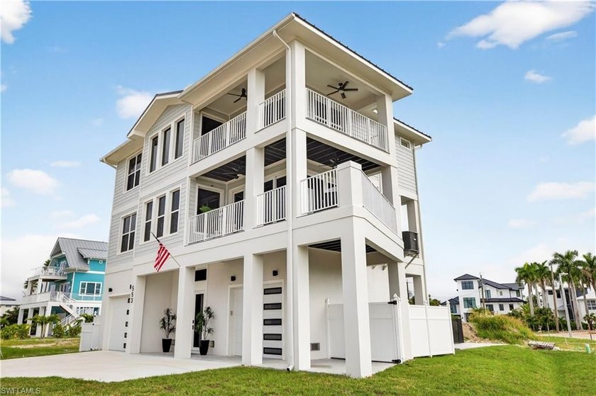 Welcome to this stunning 2025 NEW construction ELEVATED coastal - Beach Home for sale in Fort Myers Beach, Florida on Beachhouse.com
