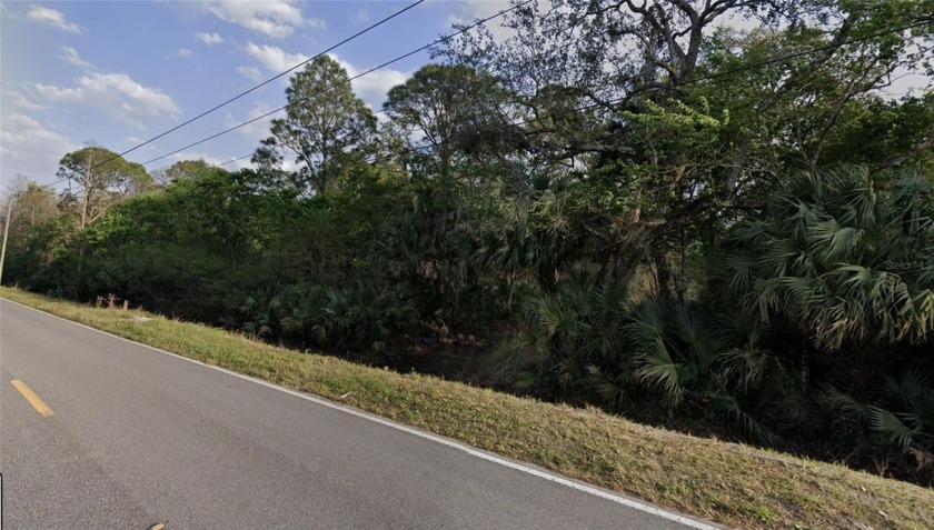 Escape to tranquility on this pristine 1.25-acre parcel in Mims - Beach Lot for sale in Mims, Florida on Beachhouse.com