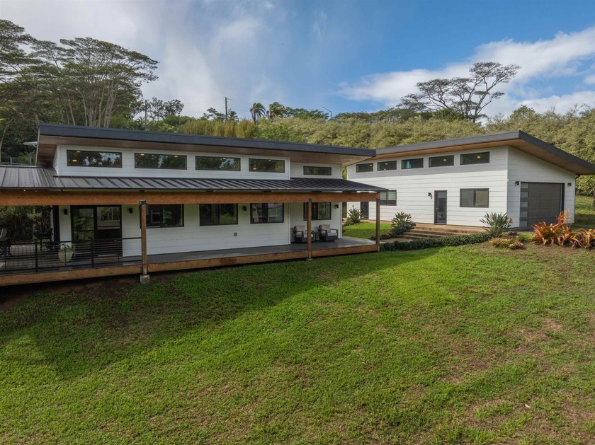 Surrounded by lush greenery on .847 acres, this new custom home - Beach Home for sale in Haiku, Hawaii on Beachhouse.com