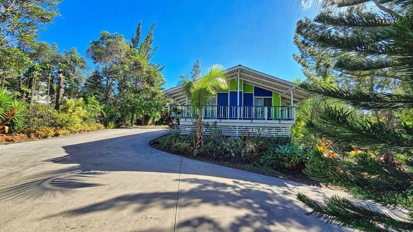 This captivating 2-bedroom, 2-bathroom home has newer laminate - Beach Home for sale in Ocean View, Hawaii on Beachhouse.com