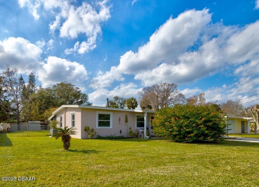 Fall in love with this charming home, ideally located near - Beach Home for sale in New Smyrna Beach, Florida on Beachhouse.com