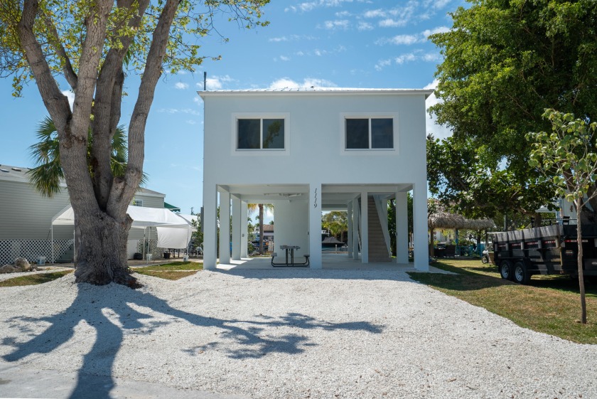 Welcome to coastal living at its finest with this BRAND-NEW 3 - Beach Home for sale in Key Largo, Florida on Beachhouse.com