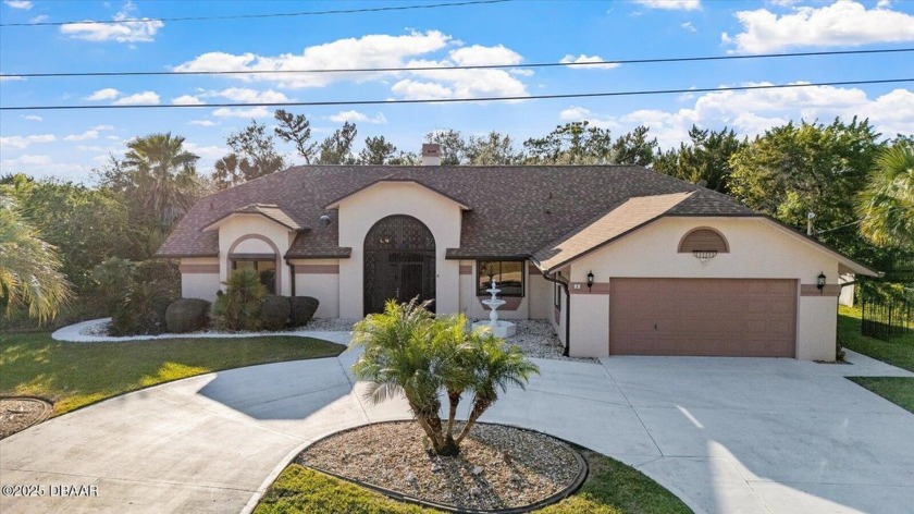 Welcome to your dream home at 5 Cimmaron Dr! This stunning - Beach Home for sale in Palm Coast, Florida on Beachhouse.com