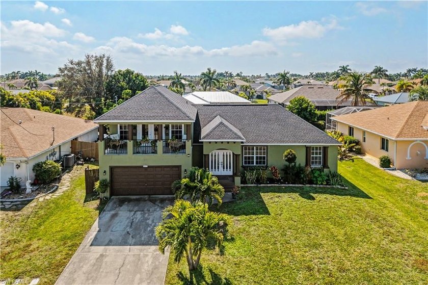 Embrace luxury and comfort in this stunning two-story pool home - Beach Home for sale in Cape Coral, Florida on Beachhouse.com