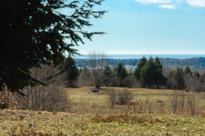 With huge views of Lake Michigan and Portage Lake, this approx - Beach Acreage for sale in Onekama, Michigan on Beachhouse.com