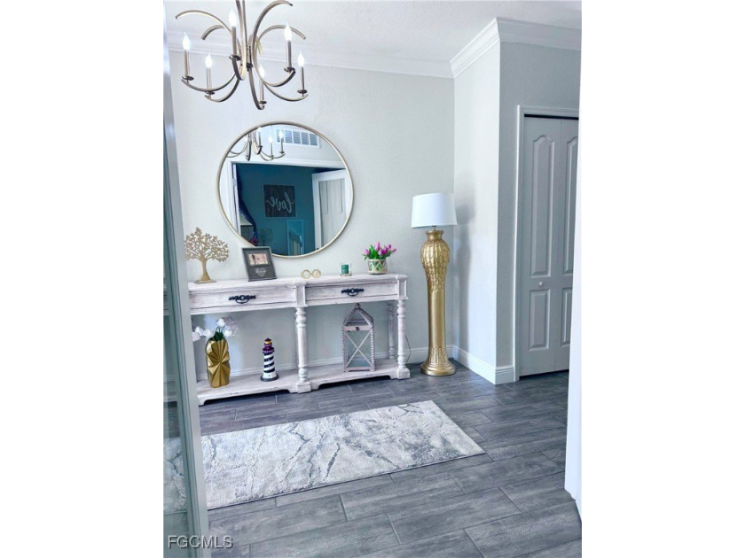 This beautifully designed 3-bedroom, 2.5-bathroom home offers 2 - Beach Home for sale in Lehigh Acres, Florida on Beachhouse.com