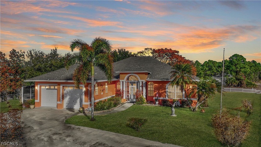 This stunning single-family home boasts 4 spacious bedrooms, 3.5 - Beach Home for sale in Lehigh Acres, Florida on Beachhouse.com