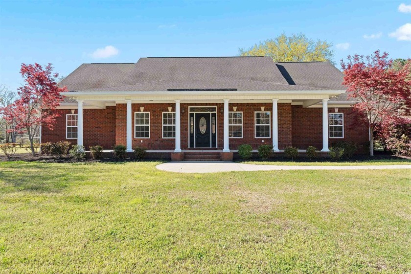 PLEASE NOTE: THIS LISTING IS FOR THE HOUSE SITTING ON ONE ACRE - Beach Home for sale in Myrtle Beach, South Carolina on Beachhouse.com