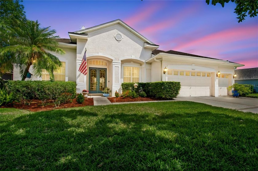 Welcome to this beautifully maintained waterfront pool home - Beach Home for sale in Land O Lakes, Florida on Beachhouse.com