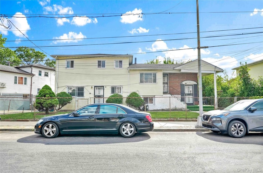 Welcome to 115-36 157th Street, a spacious two-family home in - Beach Home for sale in Jamaica, New York on Beachhouse.com