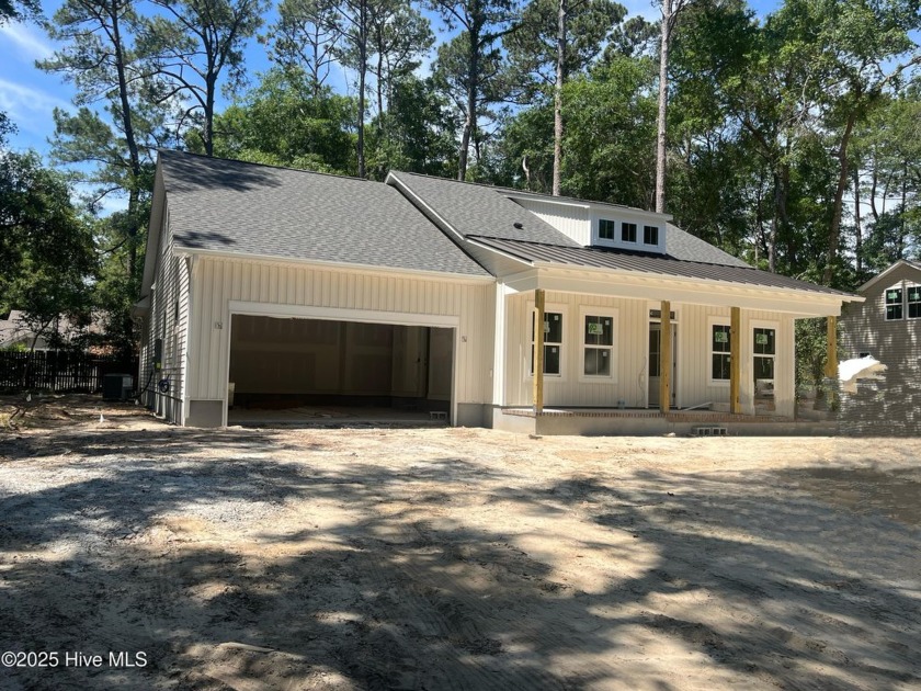 The Capeside offered by Logan Homes is perfectly nestled between - Beach Home for sale in Calabash, North Carolina on Beachhouse.com