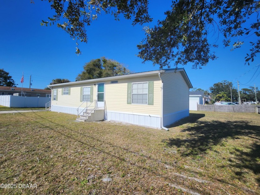 No lot rent! This property is high & dry. No flooding or - Beach Home for sale in Port Orange, Florida on Beachhouse.com