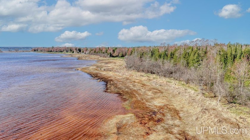 Escape to the waterfront with this rare opportunity on beautiful - Beach Acreage for sale in Rapid River, Michigan on Beachhouse.com