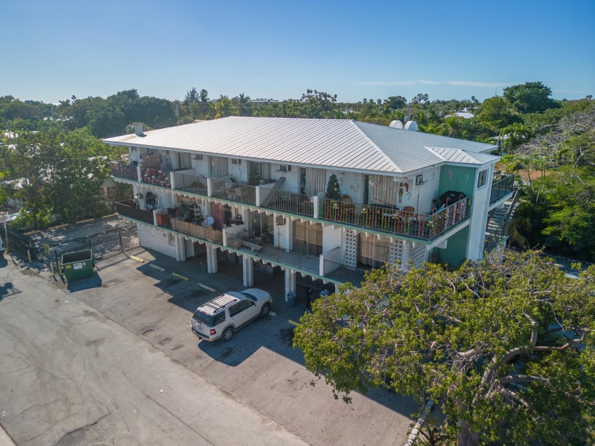 A rare opportunity to acquire a fully occupied  three-story - Beach Commercial for sale in Key West, Florida on Beachhouse.com