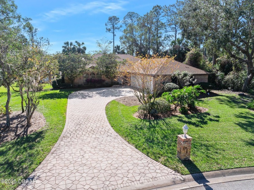 Beautiful solid brick pool home with 3 car garage in move in - Beach Home for sale in Ormond Beach, Florida on Beachhouse.com