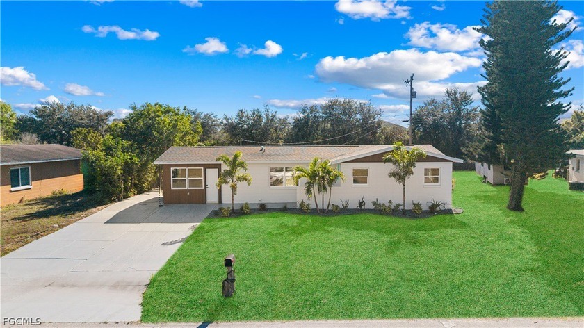 Fully remodeled and move-in ready, this beautifully updated home - Beach Home for sale in Lehigh Acres, Florida on Beachhouse.com