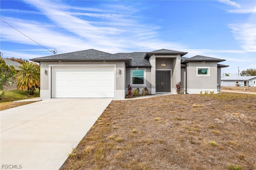 New construction and beautifully finished, this new build - Beach Home for sale in Lehigh Acres, Florida on Beachhouse.com