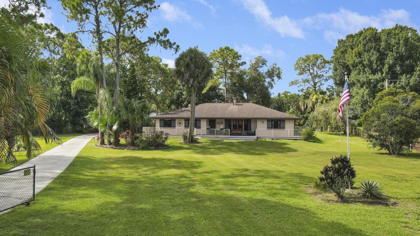 Welcome to your dream escape at 11224 54th St N in the serene - Beach Home for sale in West Palm Beach, Florida on Beachhouse.com