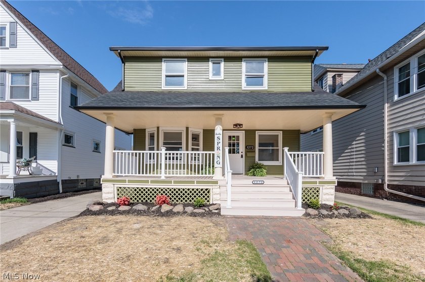 Step inside this beautifully renovated colonial where classic - Beach Home for sale in Lakewood, Ohio on Beachhouse.com