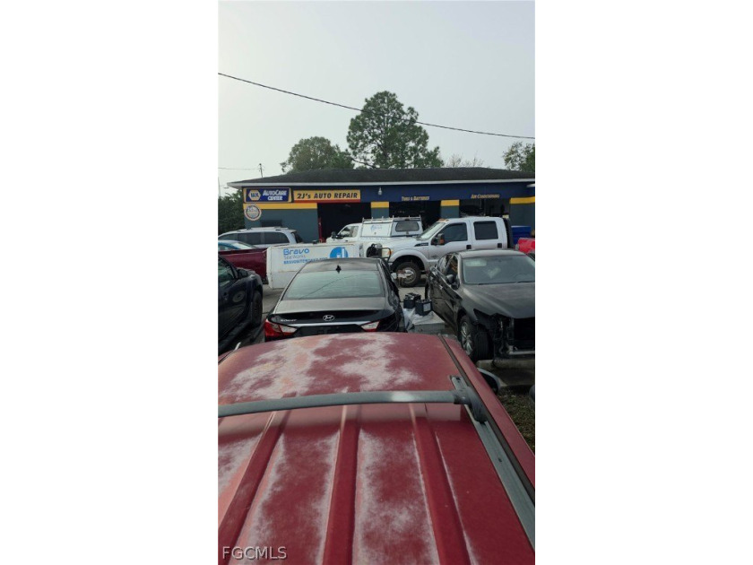 This 4300 SF Auto Repair business in a free standing Building - Beach Commercial for sale in Lehigh Acres, Florida on Beachhouse.com