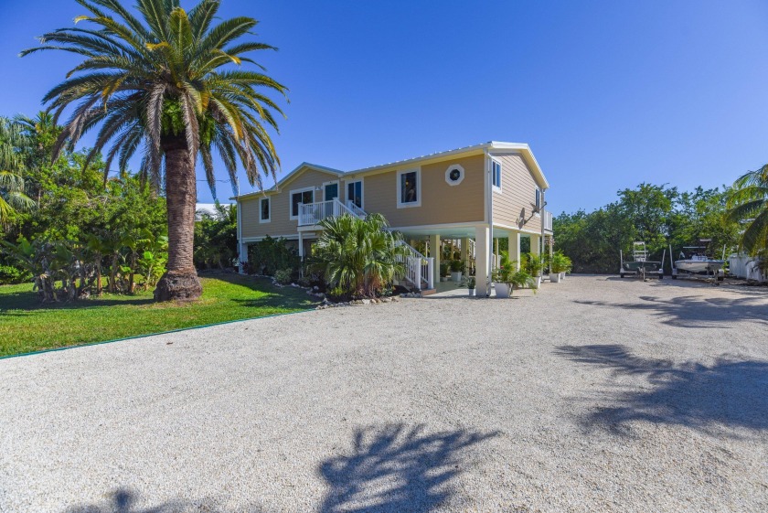 Discover this charming 3-bedroom, 2-bathroom canal-front home - Beach Home for sale in Sugarloaf Key, Florida on Beachhouse.com