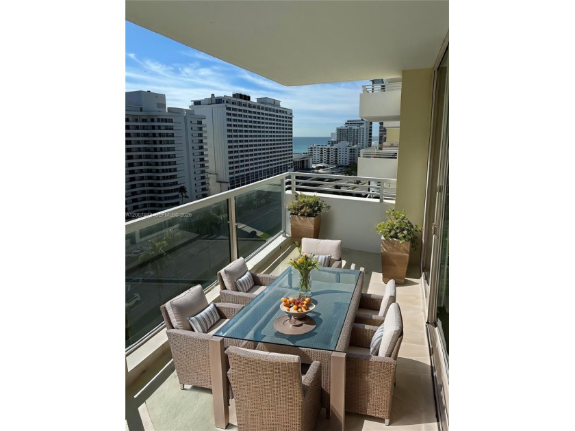 Partial ocean views from a generous balcony on Collins Avenue - Beach Condo for sale in Miami Beach, Florida on Beachhouse.com