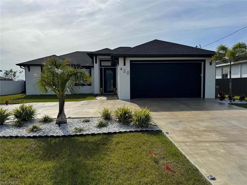 Modern property with CITY WATER & SEWER and ALL THE ASSESSMENTS - Beach Home for sale in Cape Coral, Florida on Beachhouse.com