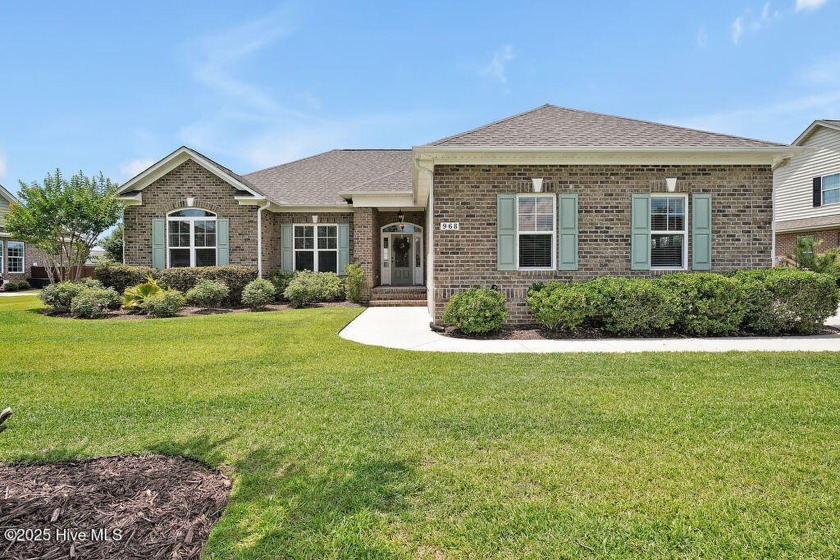 A beautiful brick home with a Canal view in Waterford of the - Beach Home for sale in Leland, North Carolina on Beachhouse.com
