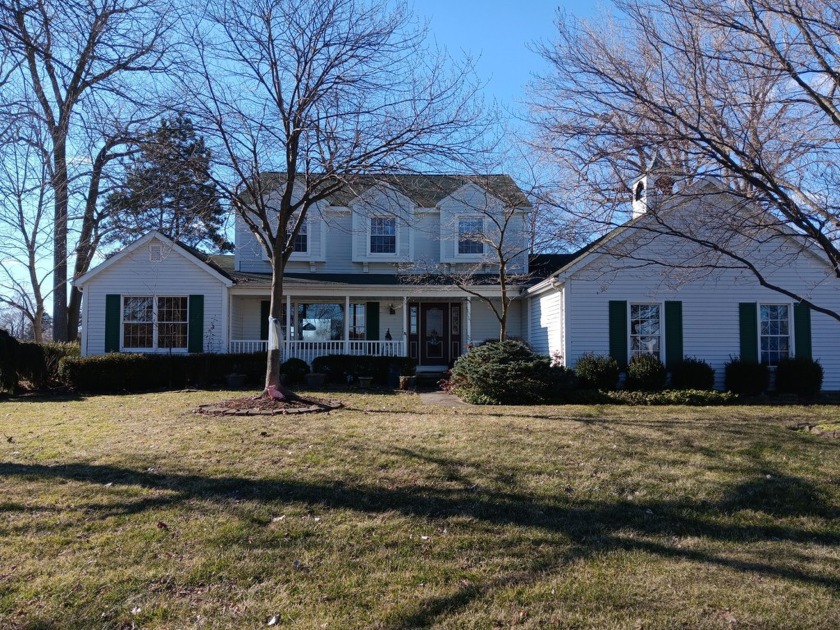 Superb waterfront home on desirable Elba Island!  240' of - Beach Home for sale in Grosse Ile, Michigan on Beachhouse.com