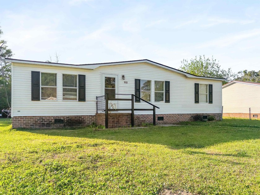 Welcome to this 3-bedroom, 2-bath home nestled in the heart of - Beach Home for sale in Myrtle Beach, South Carolina on Beachhouse.com