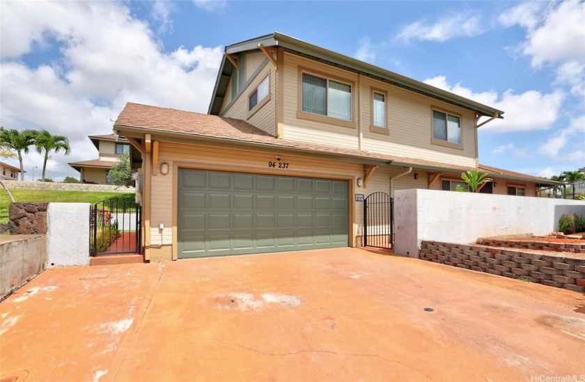 Pride of ownership shines in this lovely three bedroom, two and - Beach Home for sale in Waipahu, Hawaii on Beachhouse.com