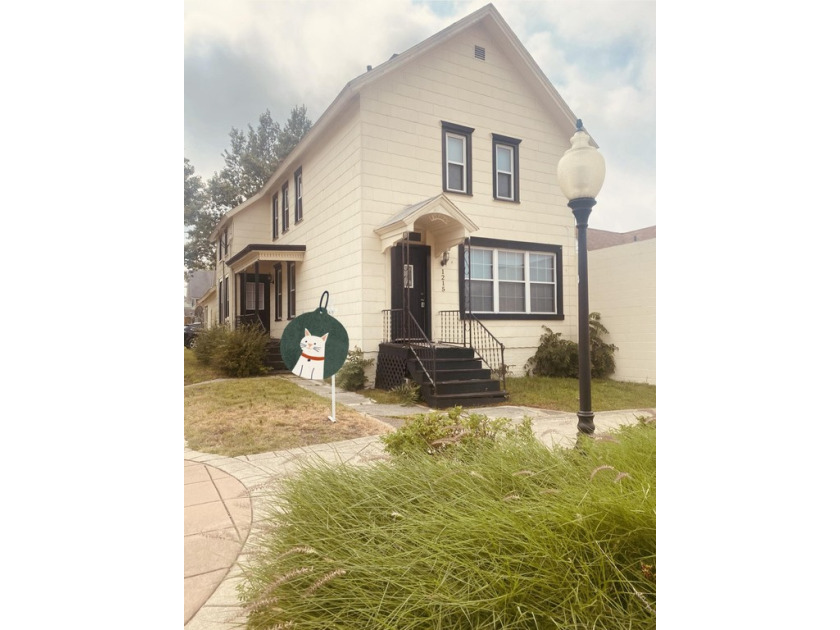 Amazing opportunity to own a mixed-use building. This is a two - Beach Townhome/Townhouse for sale in Michigan City, Indiana on Beachhouse.com