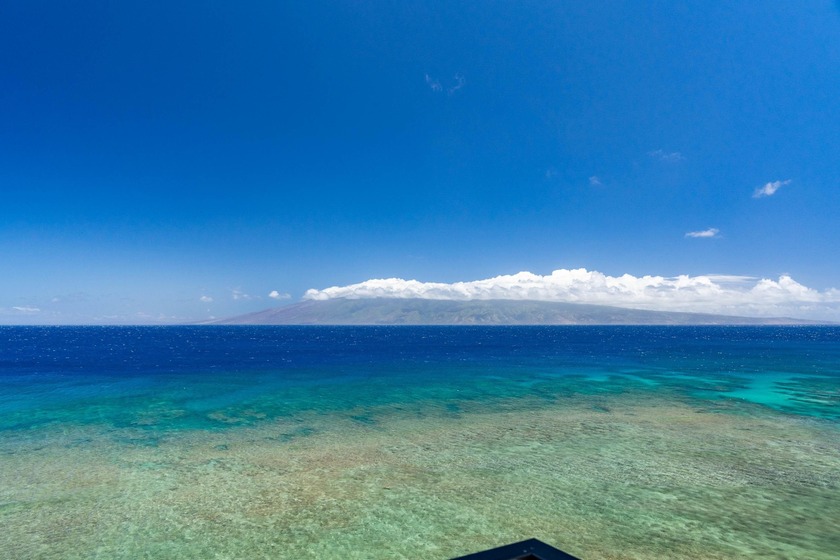 Discover a rare corner oceanfront residence where refined design - Beach Condo for sale in Lahaina, Hawaii on Beachhouse.com