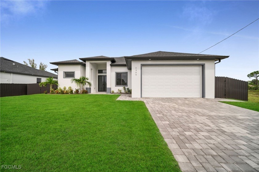 Experience modern elegance in this newly constructed gem in the - Beach Home for sale in Cape Coral, Florida on Beachhouse.com