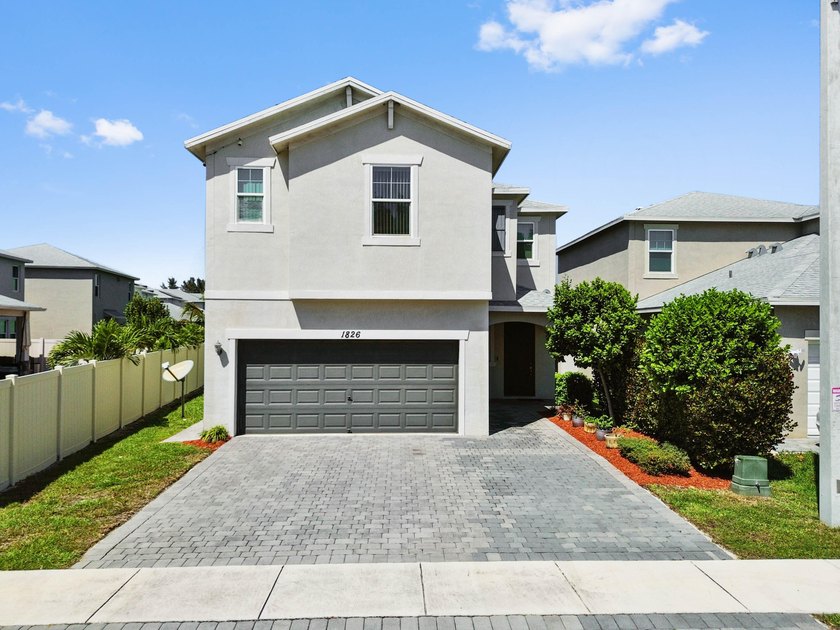 Welcome to this beautiful waterfront 2-story home in the - Beach Home for sale in Lake Worth, Florida on Beachhouse.com